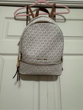 Michael Kors Cream MK Logo Mini Backpack with Brown Trim and Gold Hardware